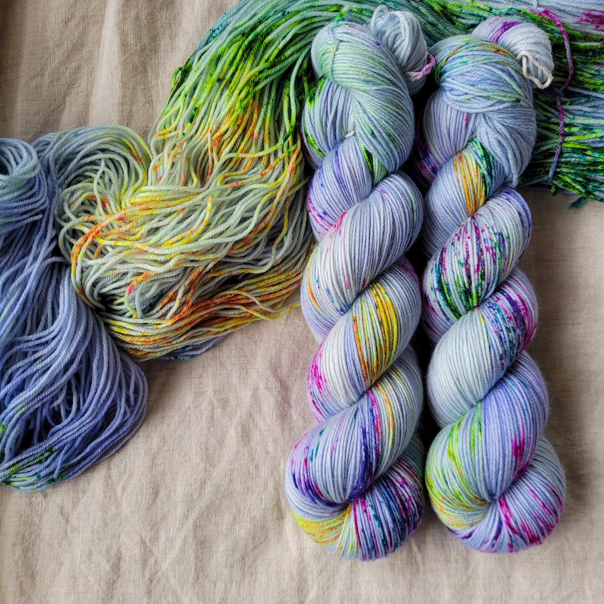 Skeins of purple and pink hand dyed yarn